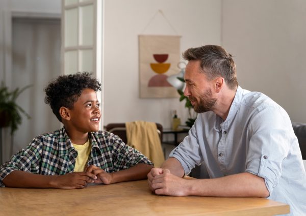 [edited]medium-shot-smiley-father-kid-home@0.5x